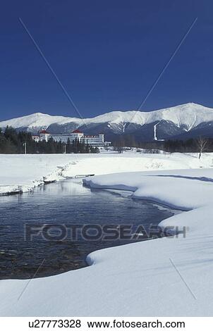 Bretton Woods, NH, New Hampshire, Scenic view of Historic Mount Washington Hotel & Resort and Mt. Washington in winter in the White Mountains National Forest. View Large Photo Image Stock Photo - Bretton Woods, NH, New Hampshire, Scenic view of Historic Mount Washington Hotel & Resort and Mt. Washington in winter in the White Mountains National Forest.. Fotosearch