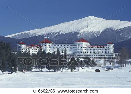 Stock Photograph -  Bretton Woods, NH, New Hampshire, Scenic view of Historic Mount Washington Hotel & Resort and Mt. Washington in winter in the White Mountains National Forest.. Fotosearch