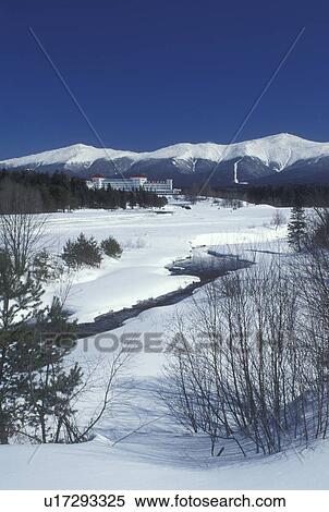 Stock Photography -  Bretton Woods, NH, New Hampshire, Scenic view of Historic Mount Washington Hotel & Resort and Mt. Washington in winter in the White Mountains National Forest.. Fotosearch