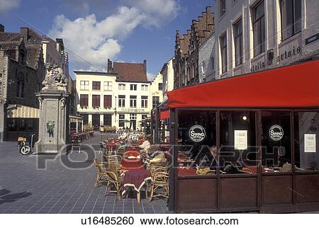 Stock Image -  Brugge, Belgium, Bruges, West-Vlaanderen, Europe. Outdoor cafTs in downtown Bruges.. Fotosearch