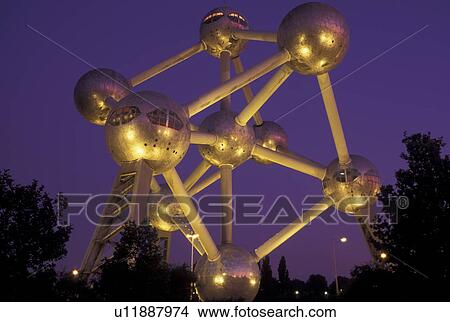 Brussels, Bruxelles, Belgium, Europe, The Atomium, symbol of the 1958 World's Fair, a monument composed of nine giant metal spheres that represent the atoms of an iron molecule, illuminated at night. View Large Photo Image Picture - Brussels, Bruxelles, Belgium, Europe, The Atomium, symbol of the 1958 World's Fair, a monument composed of nine giant metal spheres that represent the atoms of an iron molecule, illuminated at night.. Fotosearch
