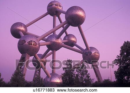 Brussels, Bruxelles, Belgium, Europe, The Atomium, symbol of the 1958 World's Fair, a monument composed of nine giant metal spheres that represent the atoms of an iron molecule, in the evening. View Large Photo Image Stock Image - Brussels, Bruxelles, Belgium, Europe, The Atomium, symbol of the 1958 World's Fair, a monument composed of nine giant metal spheres that represent the atoms of an iron molecule, in the evening.. Fotosearch