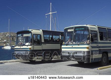 Stock Image -  bus, Paros, Greek Islands, Parikia, Cyclades, Greece, Europe, Local buses parked at the bus station in Parikia on Paros Island on the Aegean Sea.. Fotosearch