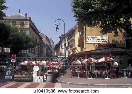 Stock Photograph -  cafT, France, Aix-Les-Bains, Savoie, Rhone-Alpes, Europe, Outdoor cafes and shops in the spa resort town of Aix-les-Bains.. Fotosearch