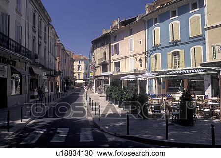 cafT, France, Orange, Provence, Vaucluse, Europe, Outdoor cafes and shops along a narrow street in downtown Orange. View Large Photo Image Stock Image - cafT, France, Orange, Provence, Vaucluse, Europe, Outdoor cafes and shops along a narrow street in downtown Orange.. Fotosearch