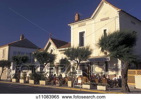 Stock Photography -  cafT, France, Saintes-Maries-de-la-Mer, Camargues, Bouches-du-Rhone, Provence, Europe, Outdoor cafT in the village of Saintes-Maries-de-la-Mer.. Fotosearch