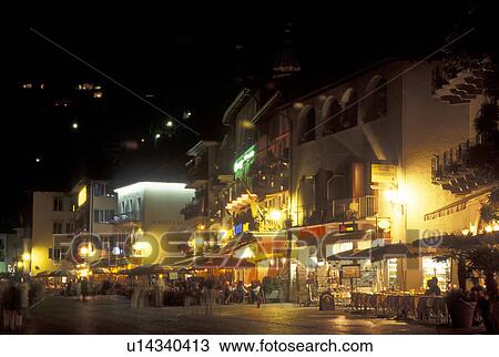 cafT, Switzerland, Ticino, Ascona, Lake Maggiore, Outdoor cafTs along the lakefront in the city of Ascona at night. View Large Photo Image Stock Image - cafT, Switzerland, Ticino, Ascona, Lake Maggiore, Outdoor cafTs along the lakefront in the city of Ascona at night.. Fotosearch