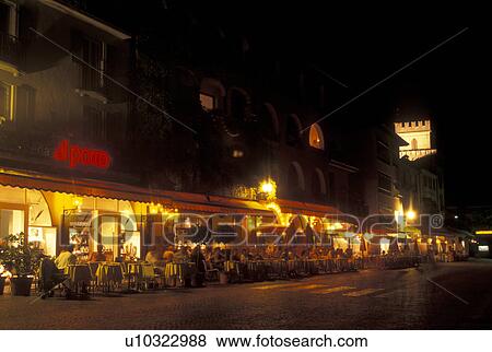 cafT, Switzerland, Ticino, Ascona, Lake Maggiore, Outdoor cafTs along the lakefront in the city of Ascona at night. View Large Photo Image Stock Photo - cafT, Switzerland, Ticino, Ascona, Lake Maggiore, Outdoor cafTs along the lakefront in the city of Ascona at night.. Fotosearch