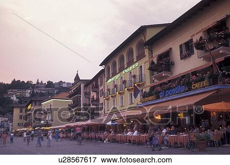 cafT, Switzerland, Ticino, Ascona, Lake Maggiore, Outdoor cafTs along the lakefront in the city of Ascona at night. View Large Photo Image Stock Photo - cafT, Switzerland, Ticino, Ascona, Lake Maggiore, Outdoor cafTs along the lakefront in the city of Ascona at night.. Fotosearch