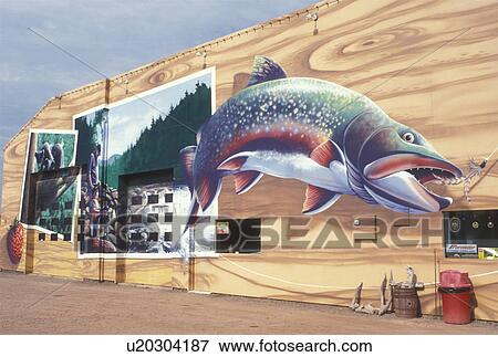 Stock Photo -  Canada, Ontario, Mural painting of a large fish on the side of a building in Ontario . Fotosearch