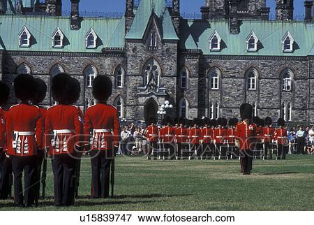 Stock Photo -  Canada, Ottawa, Ontario, Changing of the Guard on the lawn of Parliament Hill in the capital city of Ottawa.. Fotosearch