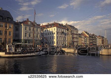 canal, Copenhagen, Denmark, Scandinavia, Sjaelland, Europe, Boats docked along Nyhavn (New Harbor) in the scenic city of Copenhagen View Large Photo Image Stock Photography - canal, Copenhagen, Denmark, Scandinavia, Sjaelland, Europe, Boats docked along Nyhavn (New Harbor) in the scenic city of Copenhagen. Fotosearch