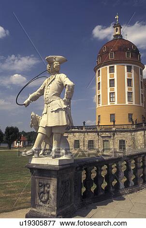 Stock Photo -  castle, Moritzburg, Dresden, Germany, Saxony, Sachen, Europe, Statue of hunter and dog on the grounds of Jagdschloss Moritzburg built in 1730. Fotosearch
