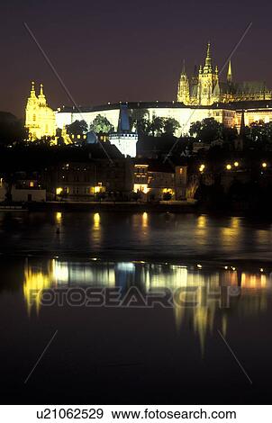 castle, Prague, Vltava River, Czech Republic, Praha, Central Bohemia, Prague Castle reflects in the calm waters of the Vltava River at night. View Large Photo Image Stock Photo - castle, Prague, Vltava River, Czech Republic, Praha, Central Bohemia, Prague Castle reflects in the calm waters of the Vltava River at night.. Fotosearch