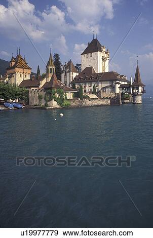 castle, Switzerland, Berne, Bern, Thunersee, Schloss Oberhofen along Lake Thun in the town of Oberhofen in the Bernese Oberland. View Large Photo Image Stock Photo - castle, Switzerland, Berne, Bern, Thunersee, Schloss Oberhofen along Lake Thun in the town of Oberhofen in the Bernese Oberland.. Fotosearch