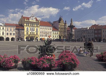 Stock Photo -  Ceske Budejovice, Czech Republic, Budweis, Southern Bohemia, Girl with her pony in The Great Square in Budweis.. Fotosearch