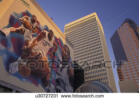Stock Image -  Charlotte, NC, North Carolina, Mural of the Charlotte Hornets Basketball team on the wall of a building in downtown Charlotte.. Fotosearch