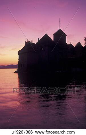 chateau, Chateau de Chillon, Lake Geneva, sunset, Switzerland, Vaud, Montreux, Silhouette of Chateau de Chillon an 13th century fortress at sunset along the lakeshore of Lac Leman in the Canton of Vaud. View Large Photo Image Stock Photograph - chateau, Chateau de Chillon, Lake Geneva, sunset, Switzerland, Vaud, Montreux, Silhouette of Chateau de Chillon an 13th century fortress at sunset along the lakeshore of Lac Leman in the Canton of Vaud. . Fotosearch