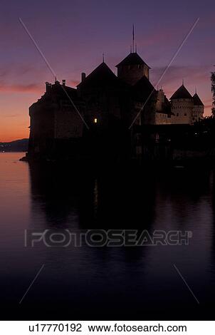 Chateau de Chillon, chateau, Switzerland, sunset, Lake Geneva, Montreux, Vaud, Silhouette of Chateau de Chillon an 13th century fortress at sunset along the lakeshore of Lac Leman in the Canton of Vaud. View Large Photo Image Stock Image - Chateau de Chillon, chateau, Switzerland, sunset, Lake Geneva, Montreux, Vaud, Silhouette of Chateau de Chillon an 13th century fortress at sunset along the lakeshore of Lac Leman in the Canton of Vaud. . Fotosearch