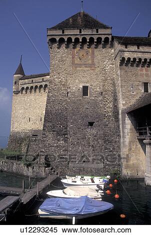 Chateau de Chillon, Switzerland, chateau, Lake Geneva, Vaud, Montreux, Chateau de Chillon an 13th century fortress along the lakeshore of Lac Leman in the Canton of Vaud. View Large Photo Image Stock Photography - Chateau de Chillon, Switzerland, chateau, Lake Geneva, Vaud, Montreux, Chateau de Chillon an 13th century fortress along the lakeshore of Lac Leman in the Canton of Vaud. . Fotosearch