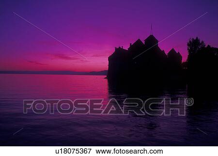 Chateau de Chillon, Vaud, Switzerland, Montreux, castle, sunset, Lake Geneva, Silhouette of Chateau de Chillon an 13th century fortress at sunset along the lakeshore of Lac Leman in the Canton of Vaud. View Large Photo Image Stock Photo - Chateau de Chillon, Vaud, Switzerland, Montreux, castle, sunset, Lake Geneva, Silhouette of Chateau de Chillon an 13th century fortress at sunset along the lakeshore of Lac Leman in the Canton of Vaud. . Fotosearch