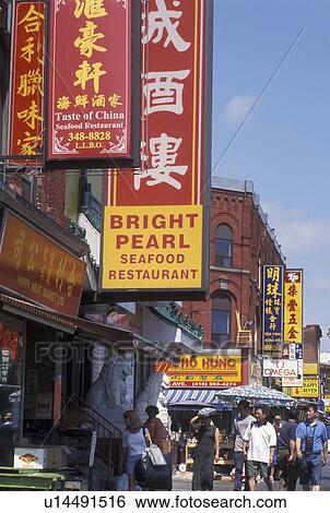 Stock Photograph -  Chinatown, Toronto, Canada, Ontario, Shops and restaurants along Spadina Avenue in Chinatown in downtown Toronto. . Fotosearch