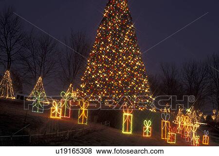 Stock Photo -  Christmas tree, decoration, Marietta, GA, Georgia, Atlanta, Lights of Life Christmas light display of Christmas tree and presents at Life College in Marietta. Fotosearch