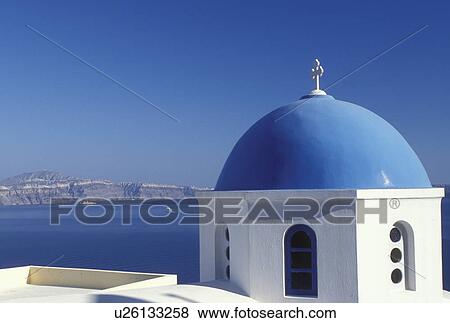 Stock Photo -  church, Santorini, Greek Islands, Oia, Cyclades, Greece, Europe, Whitewashed church with blue dome in the village of Oia overlooking the Aegean Sea on the island of Santorini.. Fotosearch