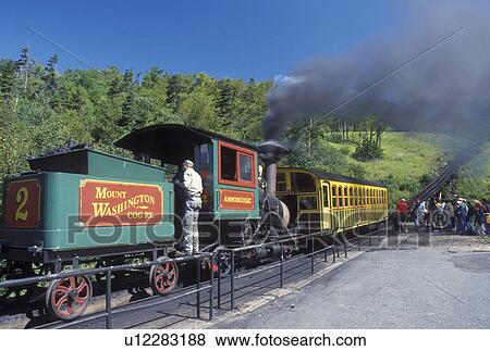 Cog Railway, Mount Washington, NH, Breton Woods, White Mountain National Forest, New Hampshire, Mt. Washington Cog Railway train loading passengers at Marshfield Station at the base of Mount Washington in the White Mountain Nat'l Forest. View Large Photo Image Stock Photo - Cog Railway, Mount Washington, NH, Breton Woods, White Mountain National Forest, New Hampshire, Mt. Washington Cog Railway train loading passengers at Marshfield Station at the base of Mount Washington in the White Mountain Nat'l Forest.. Fotosearch