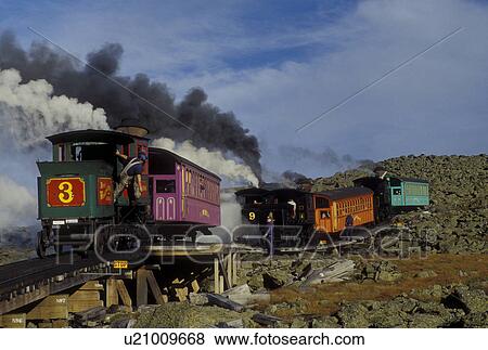 Stock Photo -  Cog Railway, Mount Washington, NH, Breton Woods, White Mountain National Forest, New Hampshire, Mt. Washington Cog Railway trains carry passengers to the summit of Mount Washington in the White Mountain Nat'l Forest.. Fotosearch