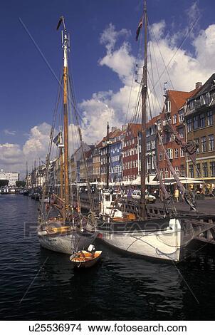 Copenhagen, Denmark, canal, Scandinavia, Sjaelland, Europe, Boats docked along Nyhavn (New Harbor) in the scenic city of Copenhagen View Large Photo Image Picture - Copenhagen, Denmark, canal, Scandinavia, Sjaelland, Europe, Boats docked along Nyhavn (New Harbor) in the scenic city of Copenhagen. Fotosearch