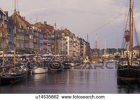 Copenhagen, Denmark, canal, Scandinavia, Sjaelland, Europe, Crowds of people along Nyhavn (New Harbor) in the scenic city of Copenhagen View Large Photo Image Stock Image - Copenhagen, Denmark, canal, Scandinavia, Sjaelland, Europe, Crowds of people along Nyhavn (New Harbor) in the scenic city of Copenhagen. Fotosearch