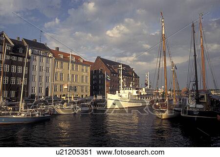 Copenhagen, Denmark, canal, Scandinavia, Sjaelland, Europe, Boats docked along Nyhavn (New Harbor) in the scenic city of Copenhagen View Large Photo Image Stock Image - Copenhagen, Denmark, canal, Scandinavia, Sjaelland, Europe, Boats docked along Nyhavn (New Harbor) in the scenic city of Copenhagen. Fotosearch