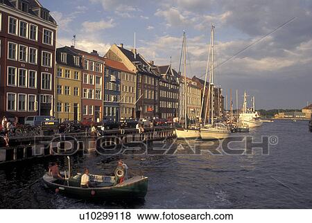 Copenhagen, Denmark, canal, Scandinavia, Sjaelland, Europe, Boats docked along Nyhavn (New Harbor) in the scenic city of Copenhagen View Large Photo Image Stock Photo - Copenhagen, Denmark, canal, Scandinavia, Sjaelland, Europe, Boats docked along Nyhavn (New Harbor) in the scenic city of Copenhagen. Fotosearch