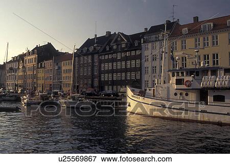 Copenhagen, Denmark, canal, Scandinavia, Sjaelland, Europe, Boats docked along Nyhavn (New Harbor) in the scenic city of Copenhagen View Large Photo Image Stock Photo - Copenhagen, Denmark, canal, Scandinavia, Sjaelland, Europe, Boats docked along Nyhavn (New Harbor) in the scenic city of Copenhagen. Fotosearch