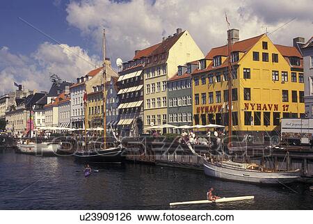 Copenhagen, Denmark, canal, Scandinavia, Sjaelland, Europe, Boats docked along Nyhavn (New Harbor) in the scenic city of Copenhagen View Large Photo Image Stock Photograph - Copenhagen, Denmark, canal, Scandinavia, Sjaelland, Europe, Boats docked along Nyhavn (New Harbor) in the scenic city of Copenhagen. Fotosearch
