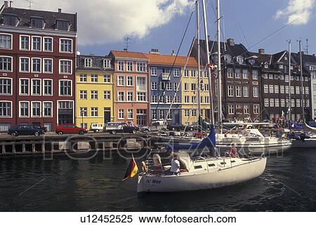 Copenhagen, Denmark, canal, Scandinavia, Sjaelland, Europe, Boats docked along Nyhavn (New Harbor) in the scenic city of Copenhagen View Large Photo Image Stock Photography - Copenhagen, Denmark, canal, Scandinavia, Sjaelland, Europe, Boats docked along Nyhavn (New Harbor) in the scenic city of Copenhagen. Fotosearch