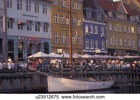Copenhagen, Denmark, canal, Scandinavia, Sjaelland, Europe, Crowds of people along Nyhavn (New Harbor) in the scenic city of Copenhagen View Large Photo Image Stock Photography - Copenhagen, Denmark, canal, Scandinavia, Sjaelland, Europe, Crowds of people along Nyhavn (New Harbor) in the scenic city of Copenhagen. Fotosearch
