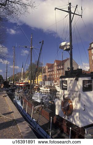 Copenhagen, Denmark, Scandinavia, Sjaelland, Europe, Barge docked along a canal in the scenic city of Copenhagen. View Large Photo Image Stock Image - Copenhagen, Denmark, Scandinavia, Sjaelland, Europe, Barge docked along a canal in the scenic city of Copenhagen. . Fotosearch