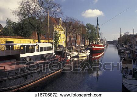 Copenhagen, Denmark, Scandinavia, Sjaelland, Europe, Boats and buildings along a canal in the scenic city of Copenhagen. View Large Photo Image Stock Image - Copenhagen, Denmark, Scandinavia, Sjaelland, Europe, Boats and buildings along a canal in the scenic city of Copenhagen. . Fotosearch