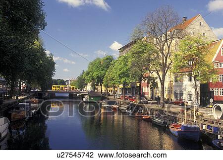 Copenhagen, Denmark, Scandinavia, Sjaelland, Europe, Boats and buildings along a canal in the scenic city of Copenhagen. View Large Photo Image Stock Image - Copenhagen, Denmark, Scandinavia, Sjaelland, Europe, Boats and buildings along a canal in the scenic city of Copenhagen. . Fotosearch