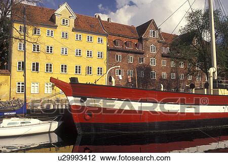 Copenhagen, Denmark, Scandinavia, Sjaelland, Europe, Large red and white sailboat (flagship) docked along a canal in the scenic city of Copenhagen. View Large Photo Image Stock Image - Copenhagen, Denmark, Scandinavia, Sjaelland, Europe, Large red and white sailboat (flagship) docked along a canal in the scenic city of Copenhagen. . Fotosearch