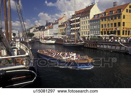 Copenhagen, Denmark, Scandinavia, Sjaelland, canal, Europe, Tour boat cruises Nyhavn (New Harbor) along the scenic city of Copenhagen View Large Photo Image Stock Photo - Copenhagen, Denmark, Scandinavia, Sjaelland, canal, Europe, Tour boat cruises Nyhavn (New Harbor) along the scenic city of Copenhagen. Fotosearch