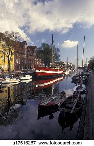 Copenhagen, Denmark, Scandinavia, Sjaelland, Europe, Boats and buildings along a canal in the scenic city of Copenhagen. View Large Photo Image Stock Photo - Copenhagen, Denmark, Scandinavia, Sjaelland, Europe, Boats and buildings along a canal in the scenic city of Copenhagen. . Fotosearch