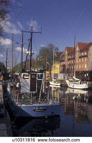 Copenhagen, Denmark, Scandinavia, Sjaelland, Europe, Boats docked along a canal in the scenic city of Copenhagen. View Large Photo Image Stock Photograph - Copenhagen, Denmark, Scandinavia, Sjaelland, Europe, Boats docked along a canal in the scenic city of Copenhagen. . Fotosearch
