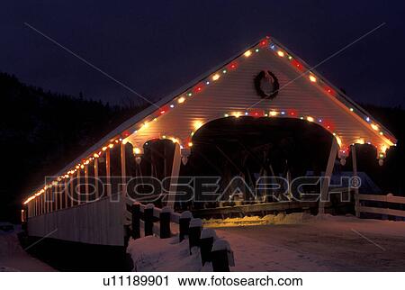 covered bridge, NH, New Hampshire, Stark, Christmas lights decorate the covered bridge in Stark at night in winter. View Large Photo Image Stock Image - covered bridge, NH, New Hampshire, Stark, Christmas lights decorate the covered bridge in Stark at night in winter.. Fotosearch