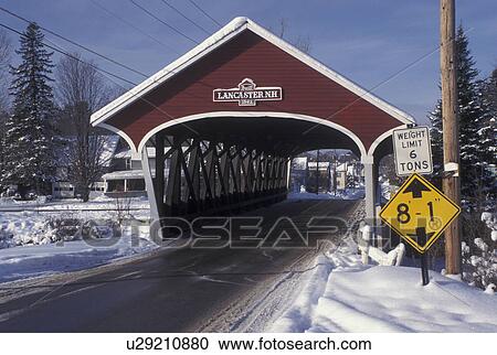 covered bridge, NH, New Hampshire, Lancaster, Red covered bridge in the winter View Large Photo Image Stock Image - covered bridge, NH, New Hampshire, Lancaster, Red covered bridge in the winter. Fotosearch