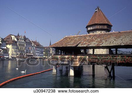 covered bridge, Switzerland, Luzern, Lucerne, Kapellbrucke, Europe, The 14th century Kapellbrucke, a pedestrian covered bridge, crosses the Reuss River in Luzern. View Large Photo Image Stock Photo - covered bridge, Switzerland, Luzern, Lucerne, Kapellbrucke, Europe, The 14th century Kapellbrucke, a pedestrian covered bridge, crosses the Reuss River in Luzern.. Fotosearch