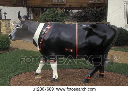 Stock Photo -  cow, New Glarus, WI, Wisconsin, Little Switzerland, Painted swiss cow in the town of New Glarus.. Fotosearch