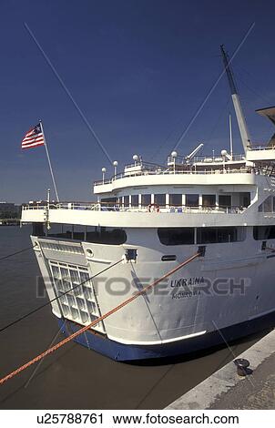Stock Image -  cruise ship, Antwerp, Belgium, Antwerpen, Europe, North Sea, Cruise ship docked along Scheldt River in Antwerpen.. Fotosearch